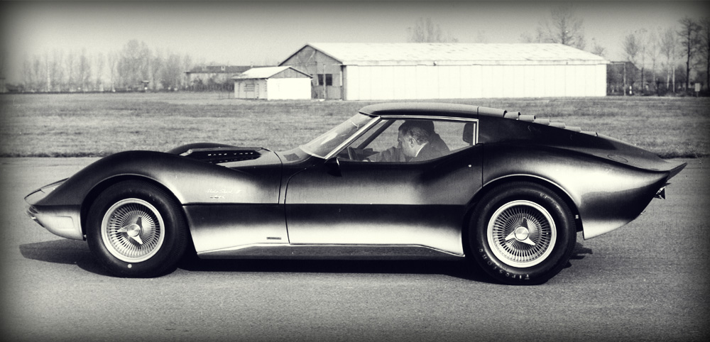 1965. Avvocato Agnelli tries the Mako Shark II, the new Dream Car on Chevrolet Corvette car frame.